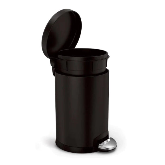 Black trash can with pedal on a white background